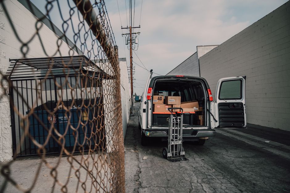 Movers loading boxes into a moving truck