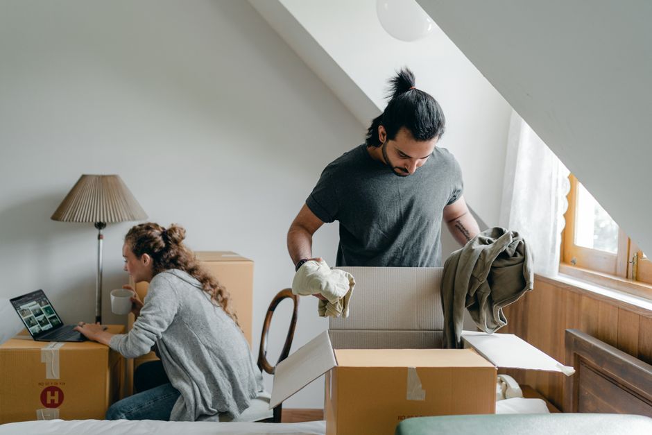Unpacking boxes in a bright new home